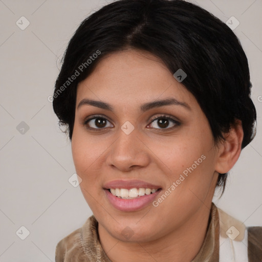 Joyful latino young-adult female with medium  brown hair and brown eyes