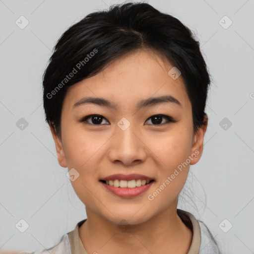 Joyful asian young-adult female with medium  black hair and brown eyes