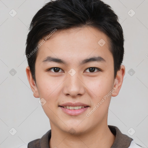 Joyful white young-adult male with short  black hair and brown eyes