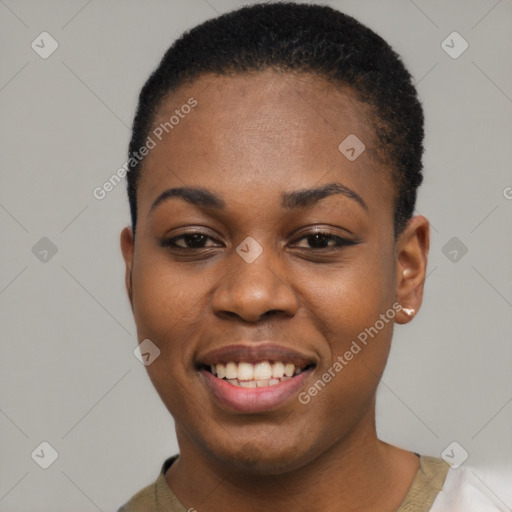 Joyful black young-adult female with short  black hair and brown eyes