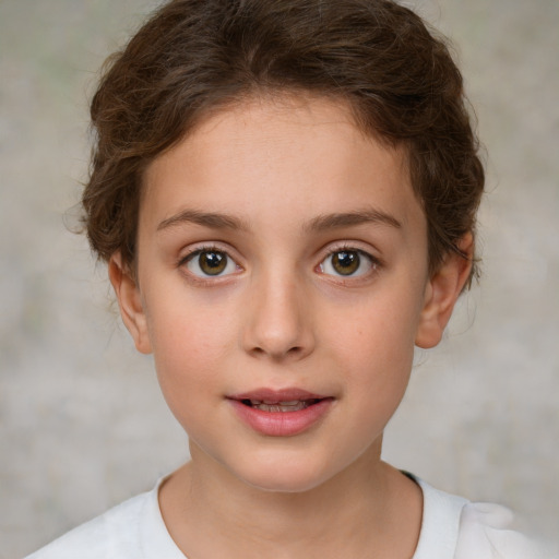 Joyful white child female with short  brown hair and brown eyes