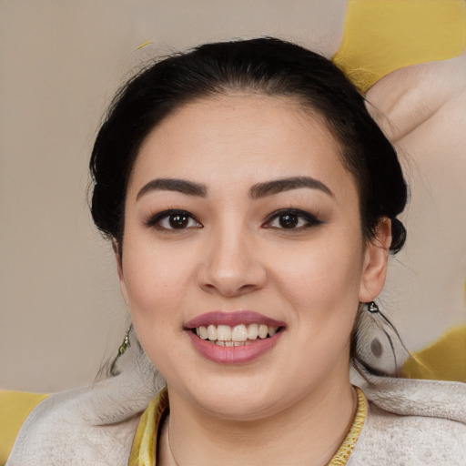 Joyful latino young-adult female with medium  black hair and brown eyes