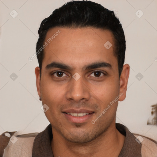 Joyful white young-adult male with short  black hair and brown eyes