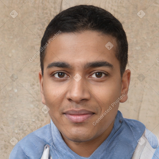 Joyful black young-adult male with short  black hair and brown eyes