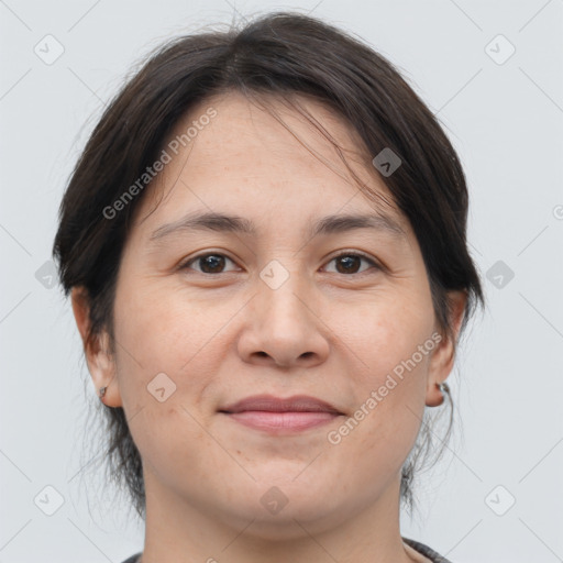 Joyful white adult female with medium  brown hair and brown eyes