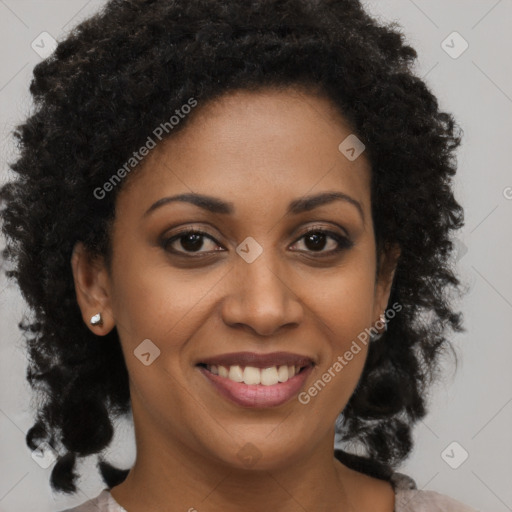 Joyful black young-adult female with medium  brown hair and brown eyes