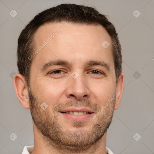 Joyful white adult male with short  brown hair and brown eyes