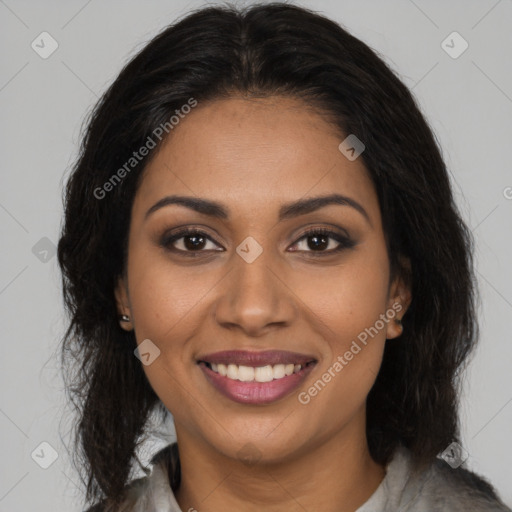 Joyful latino young-adult female with long  brown hair and brown eyes