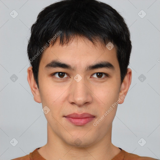 Joyful asian young-adult male with short  black hair and brown eyes