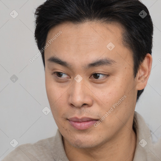 Neutral asian young-adult male with short  brown hair and brown eyes