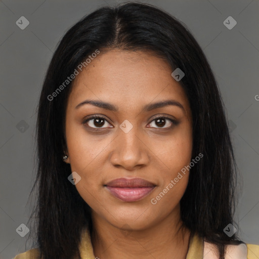 Joyful black young-adult female with long  brown hair and brown eyes