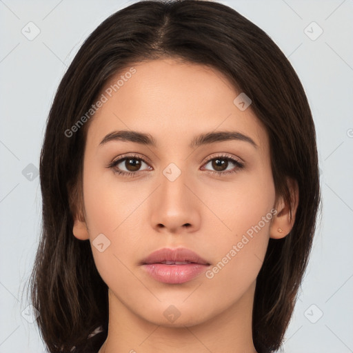 Neutral white young-adult female with long  brown hair and brown eyes