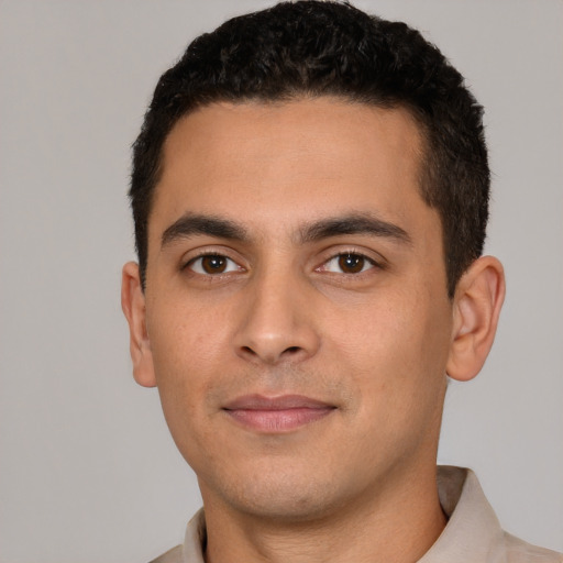 Neutral white young-adult male with short  black hair and brown eyes
