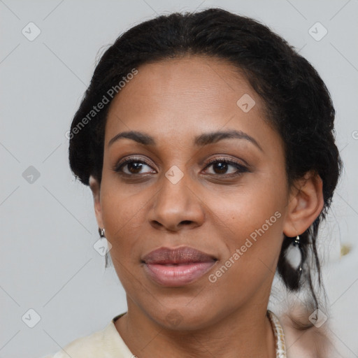 Joyful latino young-adult female with medium  brown hair and brown eyes