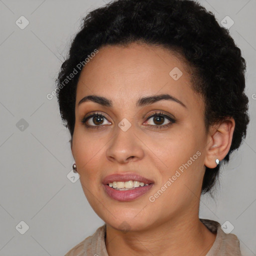 Joyful latino young-adult female with short  black hair and brown eyes