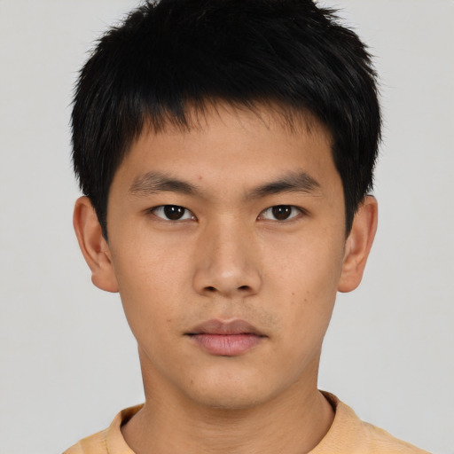 Neutral asian young-adult male with short  brown hair and brown eyes