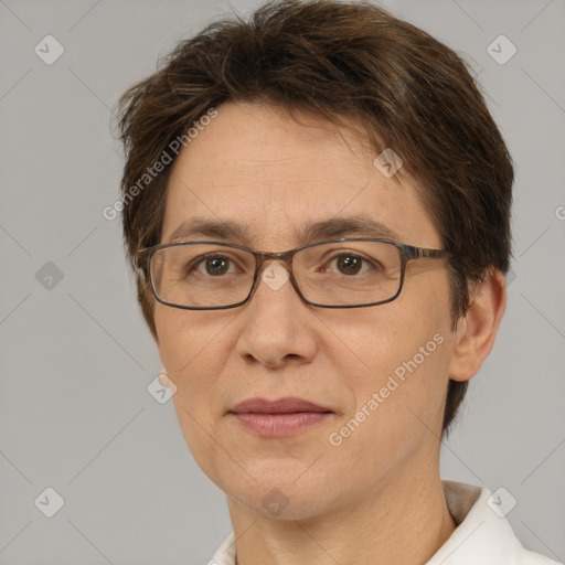 Joyful white adult female with short  brown hair and brown eyes