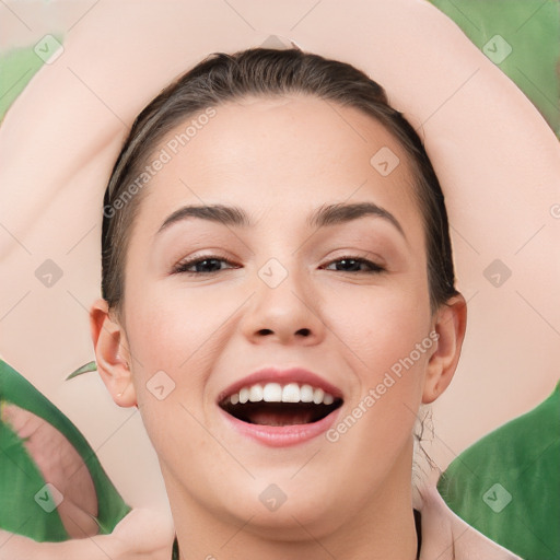 Joyful white young-adult female with medium  brown hair and brown eyes