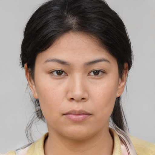 Neutral asian young-adult female with medium  brown hair and brown eyes