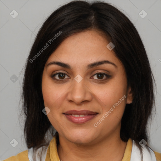 Joyful latino young-adult female with medium  brown hair and brown eyes