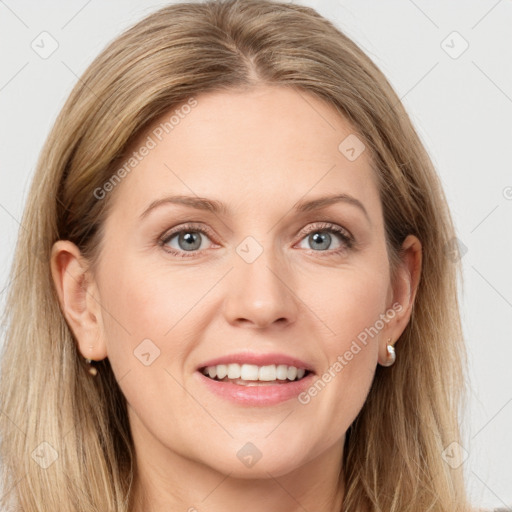 Joyful white young-adult female with long  brown hair and grey eyes