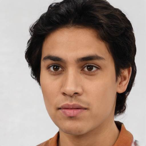 Neutral latino young-adult male with short  brown hair and brown eyes
