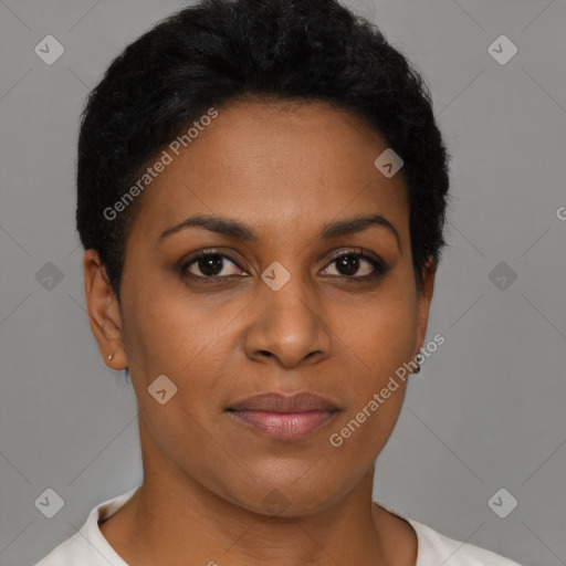 Joyful black young-adult female with short  brown hair and brown eyes