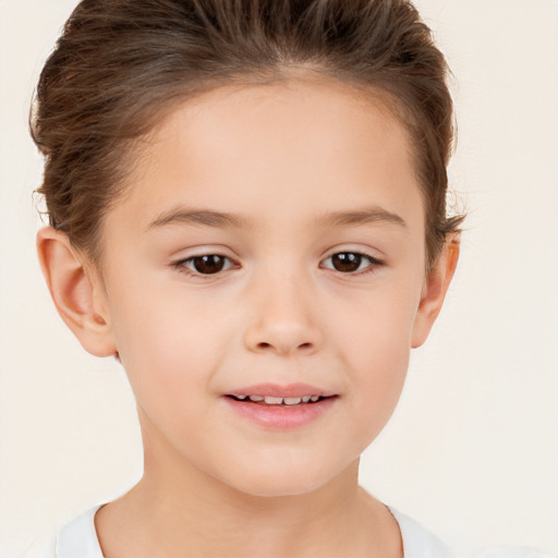 Joyful white child female with short  brown hair and brown eyes