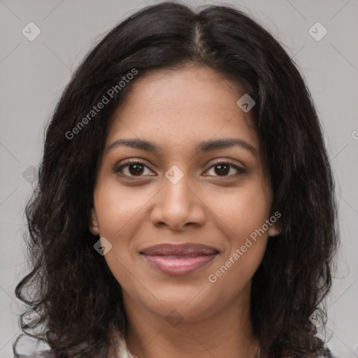 Joyful latino young-adult female with long  brown hair and brown eyes