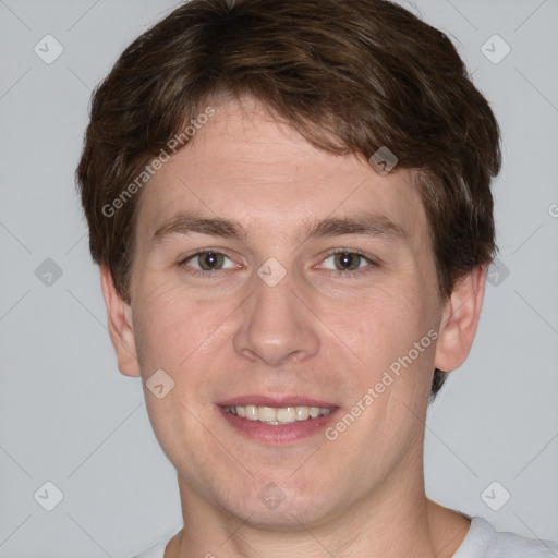 Joyful white adult male with short  brown hair and grey eyes