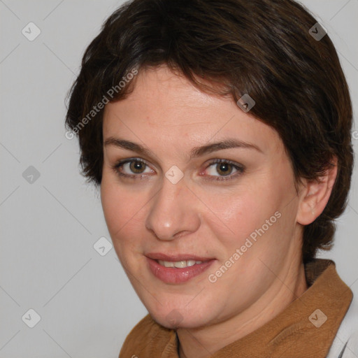 Joyful white adult female with medium  brown hair and brown eyes