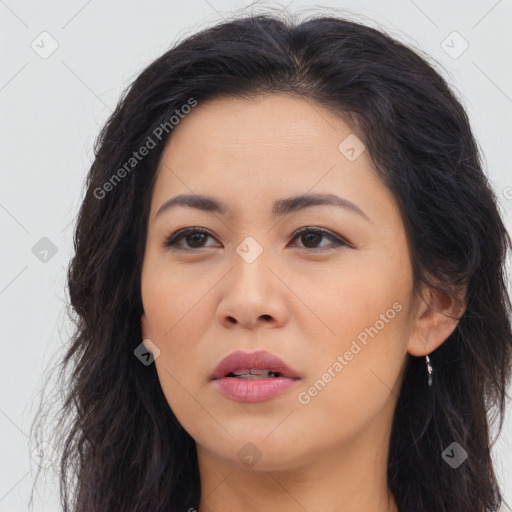 Joyful asian young-adult female with long  brown hair and brown eyes