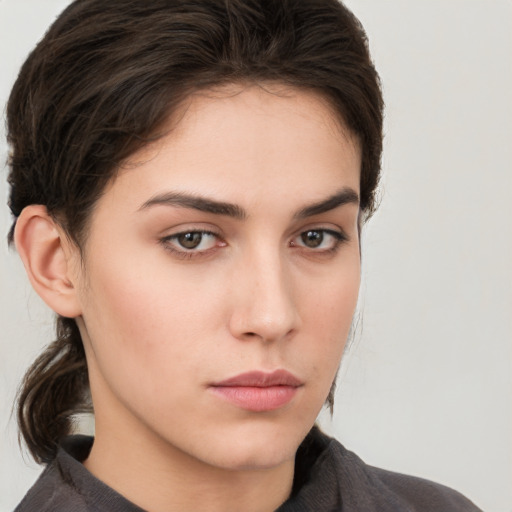 Neutral white young-adult female with medium  brown hair and brown eyes