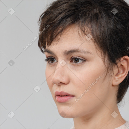 Neutral white young-adult female with medium  brown hair and brown eyes