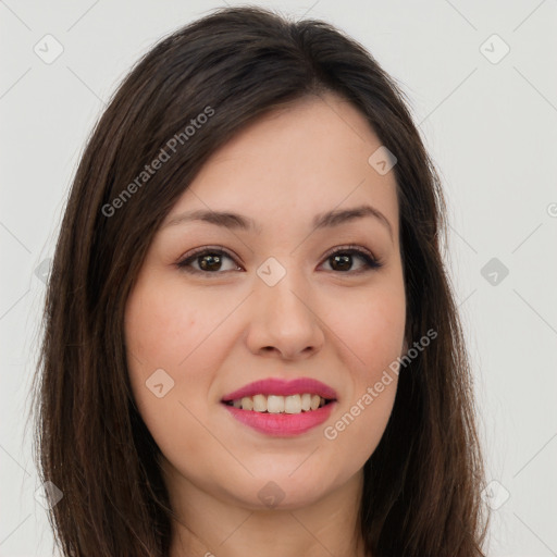 Joyful asian young-adult female with long  brown hair and brown eyes