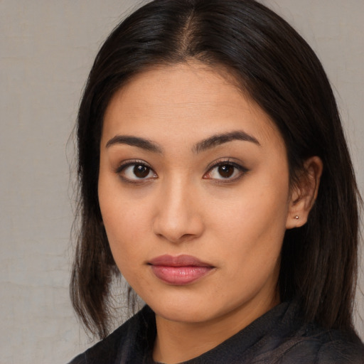 Neutral asian young-adult female with long  brown hair and brown eyes