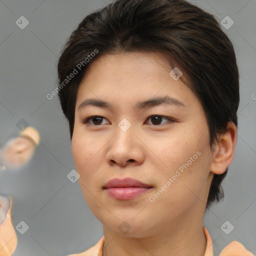 Joyful asian young-adult female with medium  brown hair and brown eyes