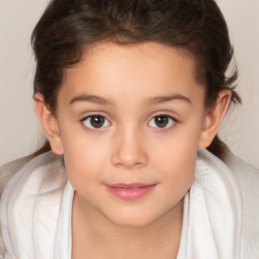 Joyful white child female with medium  brown hair and brown eyes