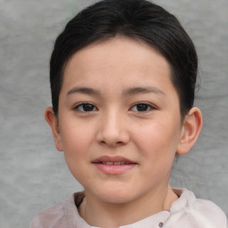 Joyful white child female with short  brown hair and brown eyes