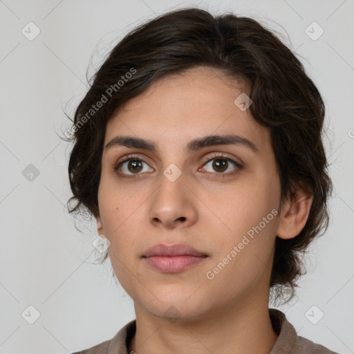 Neutral white young-adult female with medium  brown hair and brown eyes