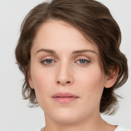 Neutral white young-adult female with medium  brown hair and green eyes