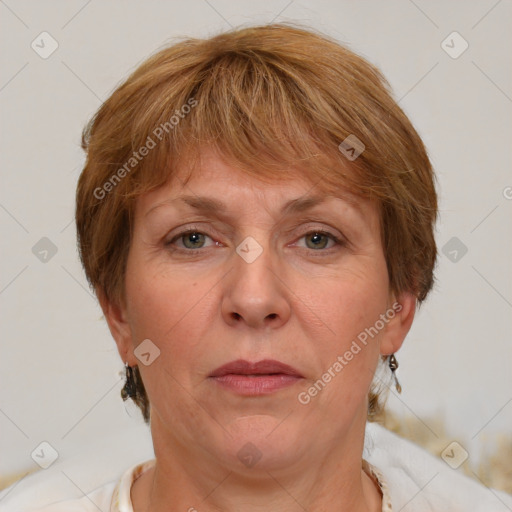 Joyful white adult female with medium  brown hair and blue eyes