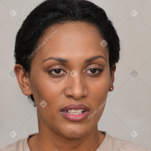 Joyful black young-adult female with short  brown hair and brown eyes