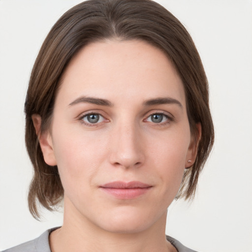 Neutral white young-adult female with medium  brown hair and grey eyes