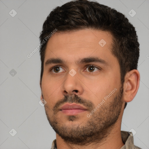 Neutral white young-adult male with short  brown hair and brown eyes