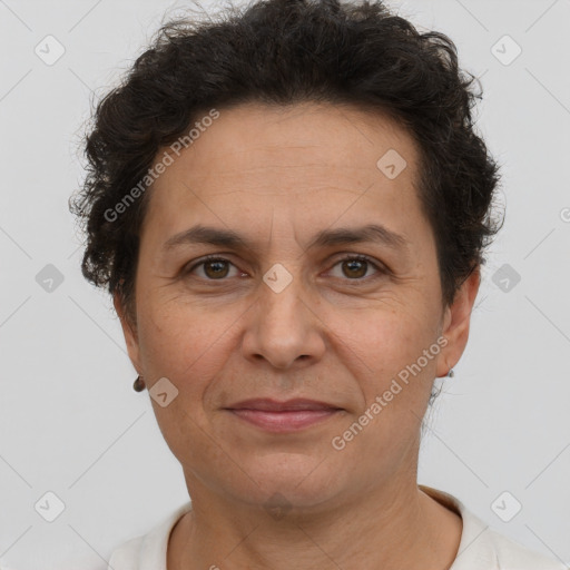 Joyful white adult female with short  brown hair and brown eyes