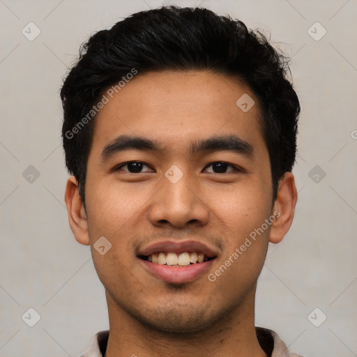 Joyful asian young-adult male with short  black hair and brown eyes