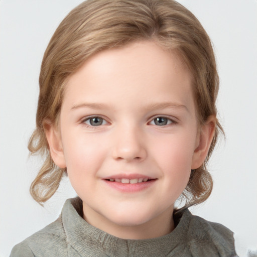 Joyful white child female with medium  brown hair and grey eyes