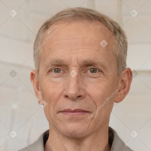 Joyful white middle-aged male with short  brown hair and brown eyes