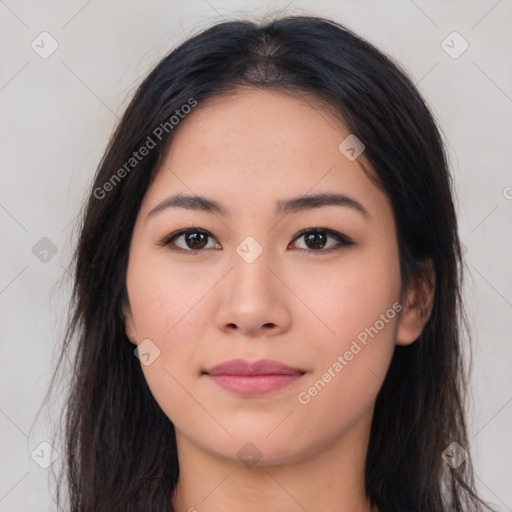 Joyful asian young-adult female with long  brown hair and brown eyes